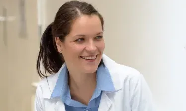 Public Health Nurse Smiling with Patient